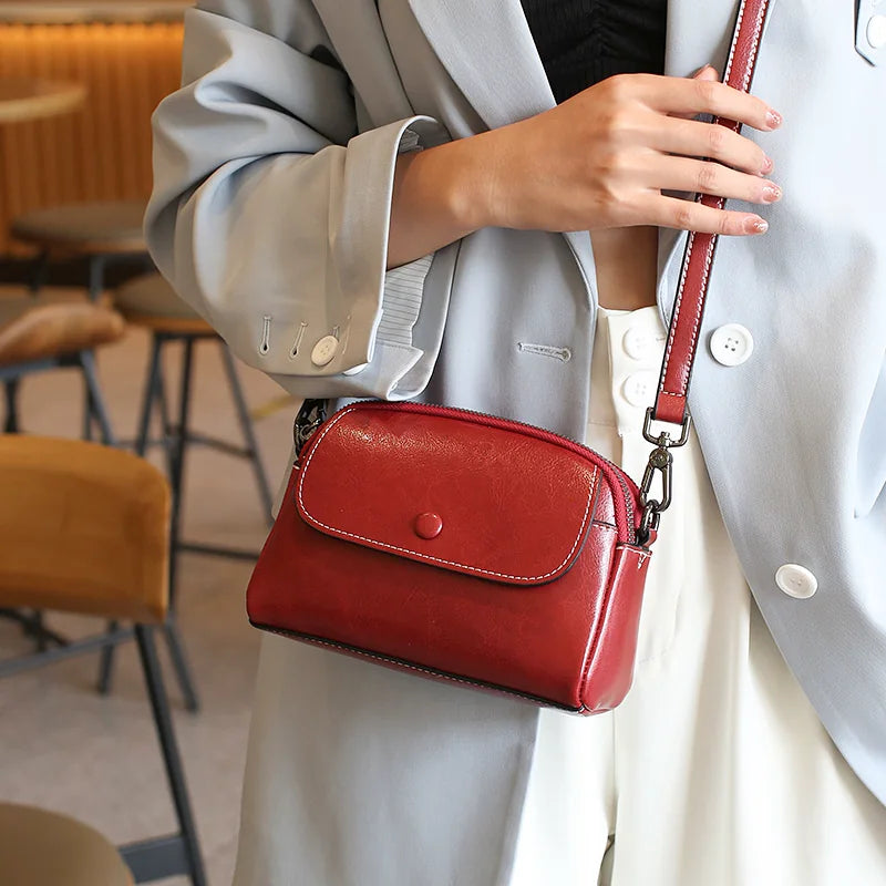 LIVIA MINI LEATHER CROSSBODY BAG